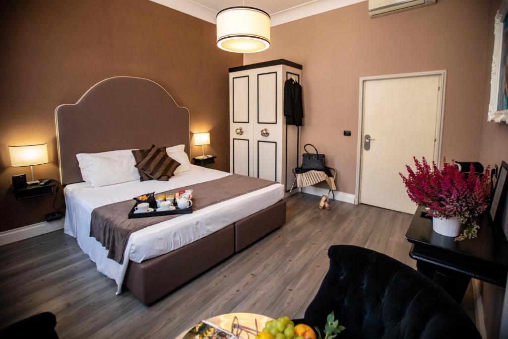 Posteľ alebo postele v izbe v ubytovaní JB Relais- Campo de' Fiori