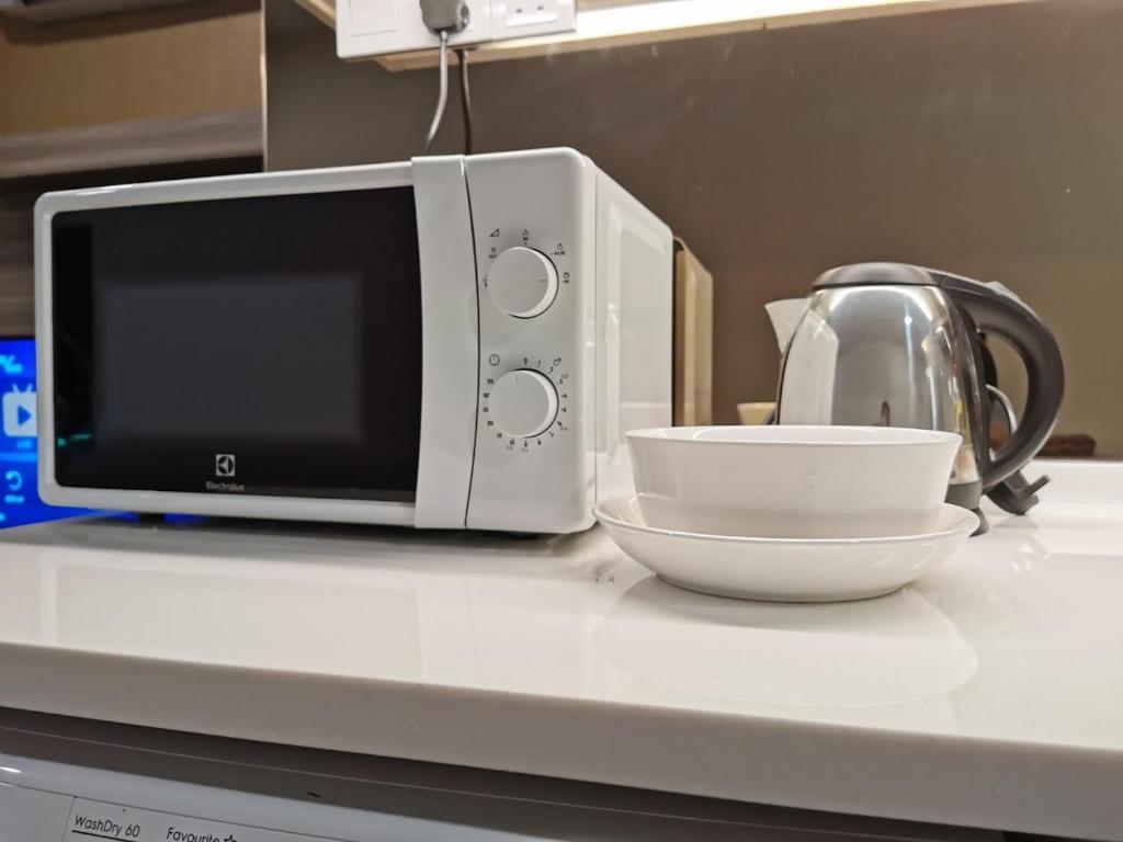 Kuchyň nebo kuchyňský kout v ubytování Cosy private suite 2BR 591 Nexus USJ Shah Alam