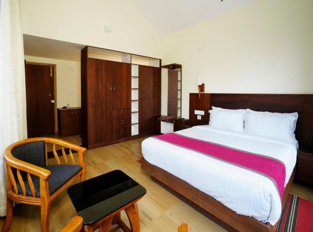 Postel nebo postele na pokoji v ubytování Indeevara Luxury Resort and Spa, Wayanad