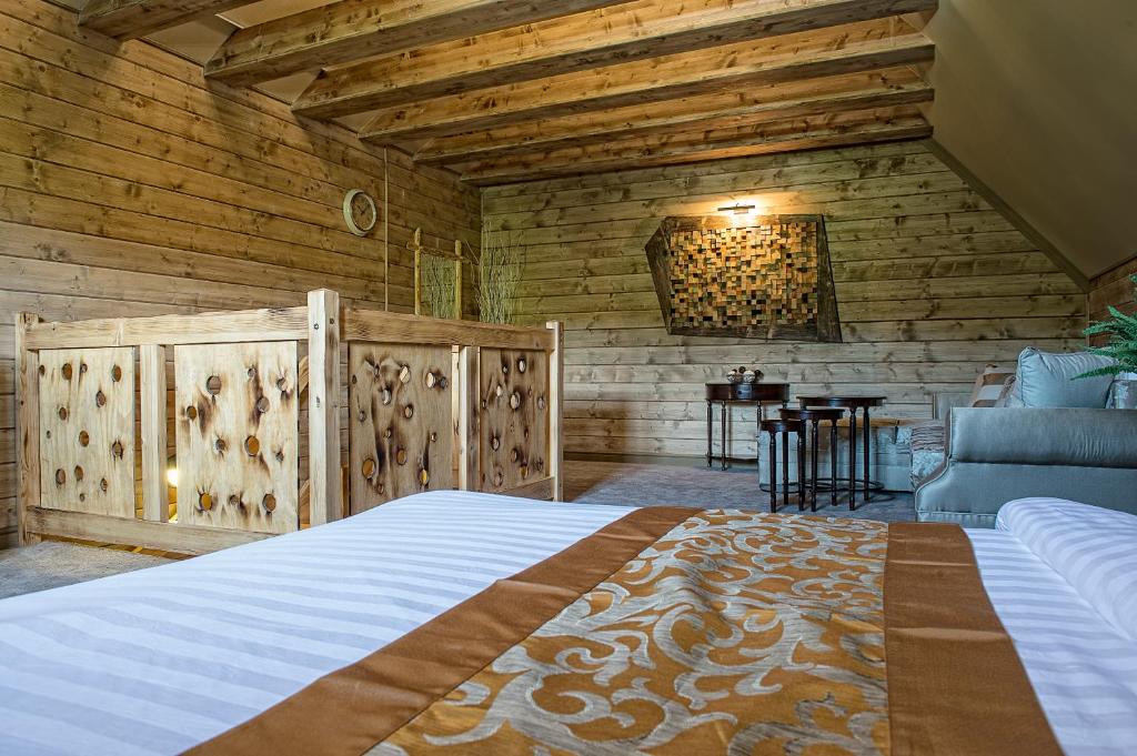 A bed or beds in a room at Mountain Resort Ždiar - River