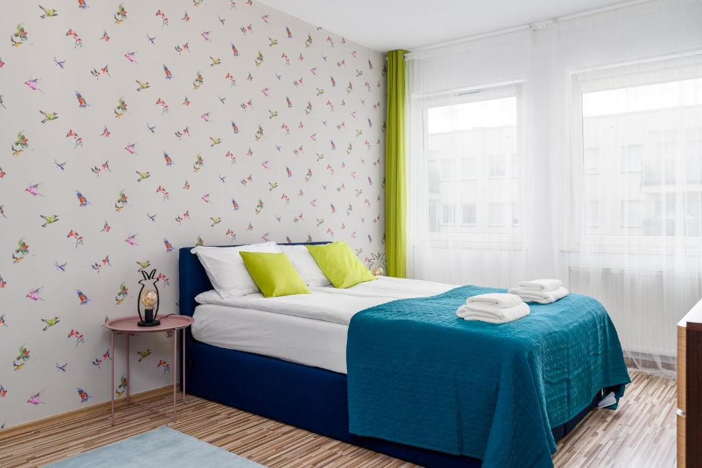 Posteľ alebo postele v izbe v ubytovaní Sleepway Apartments - Garbary 95-112a