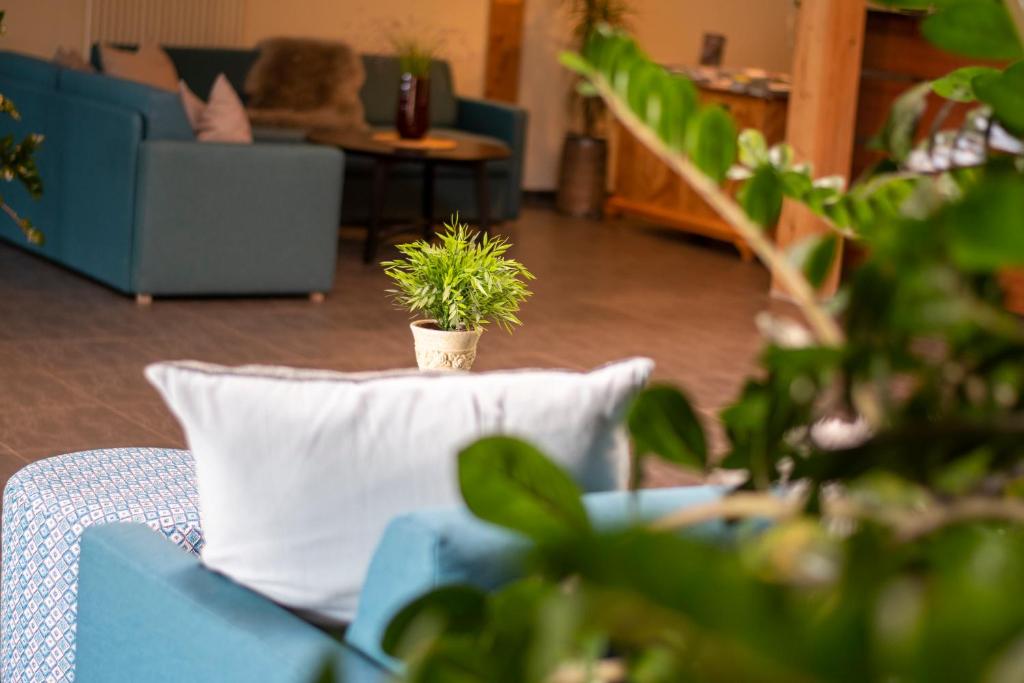 Un lugar para sentarse en Vitalhotel Quellengarten - Bed & Breakfast