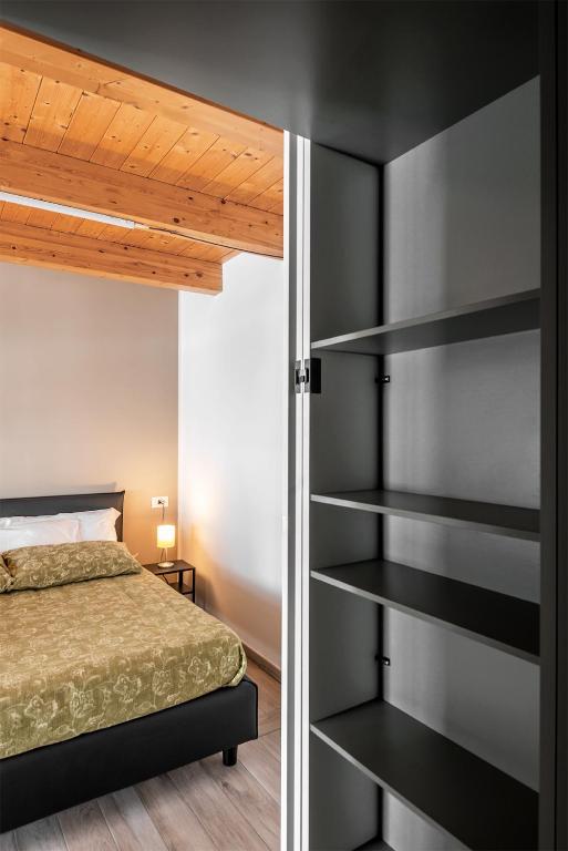 Postel nebo postele na pokoji v ubytování Casa Langhe