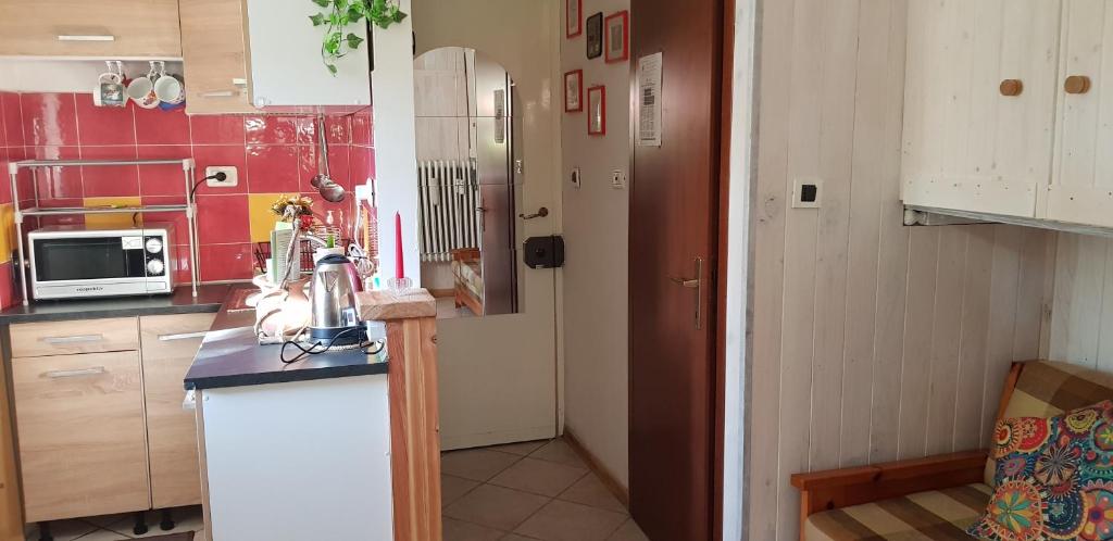 Kuchnia lub aneks kuchenny w obiekcie Le Casette