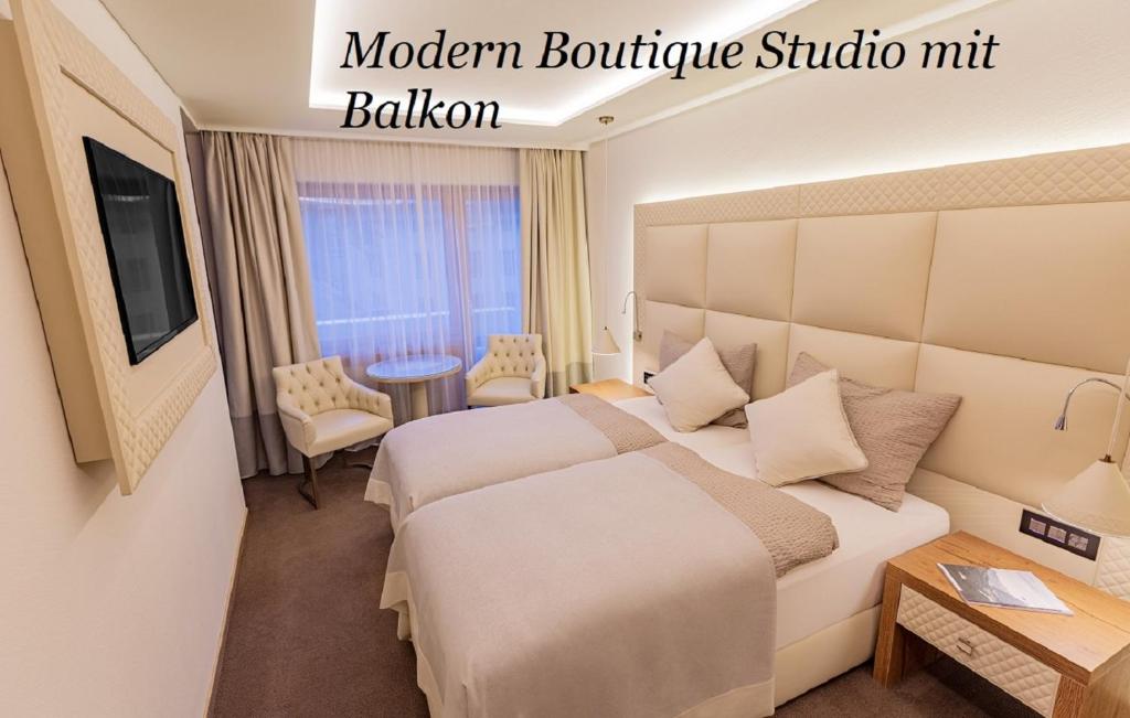 Postel nebo postele na pokoji v ubytování Hotel Arte