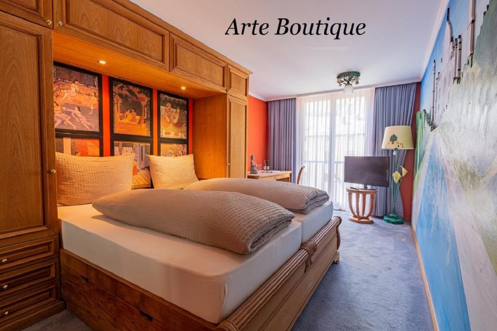 Postel nebo postele na pokoji v ubytování Hotel Arte