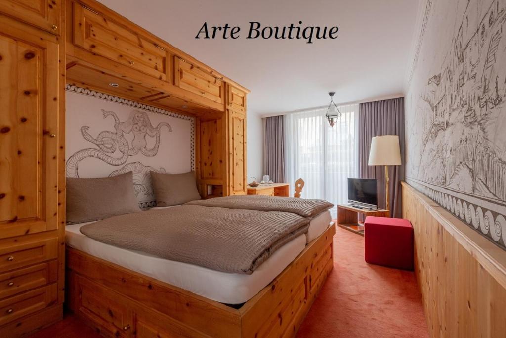 Postel nebo postele na pokoji v ubytování Hotel Arte