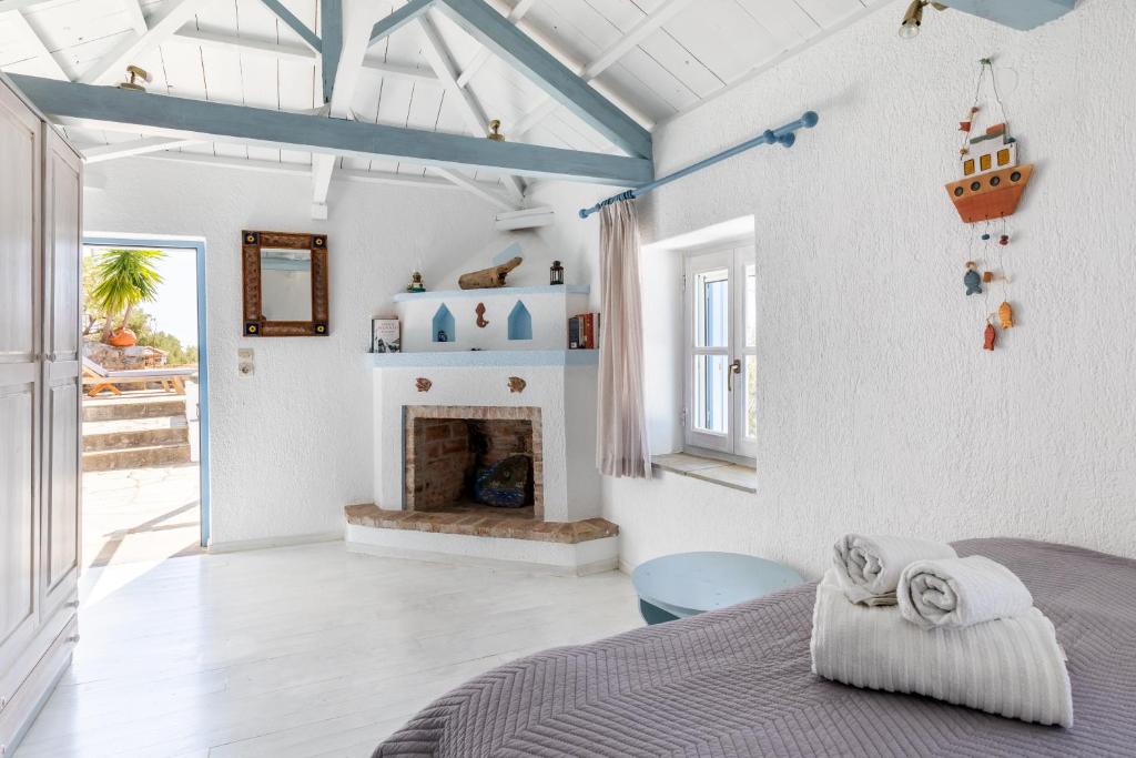Postel nebo postele na pokoji v ubytování Pigi Cottage