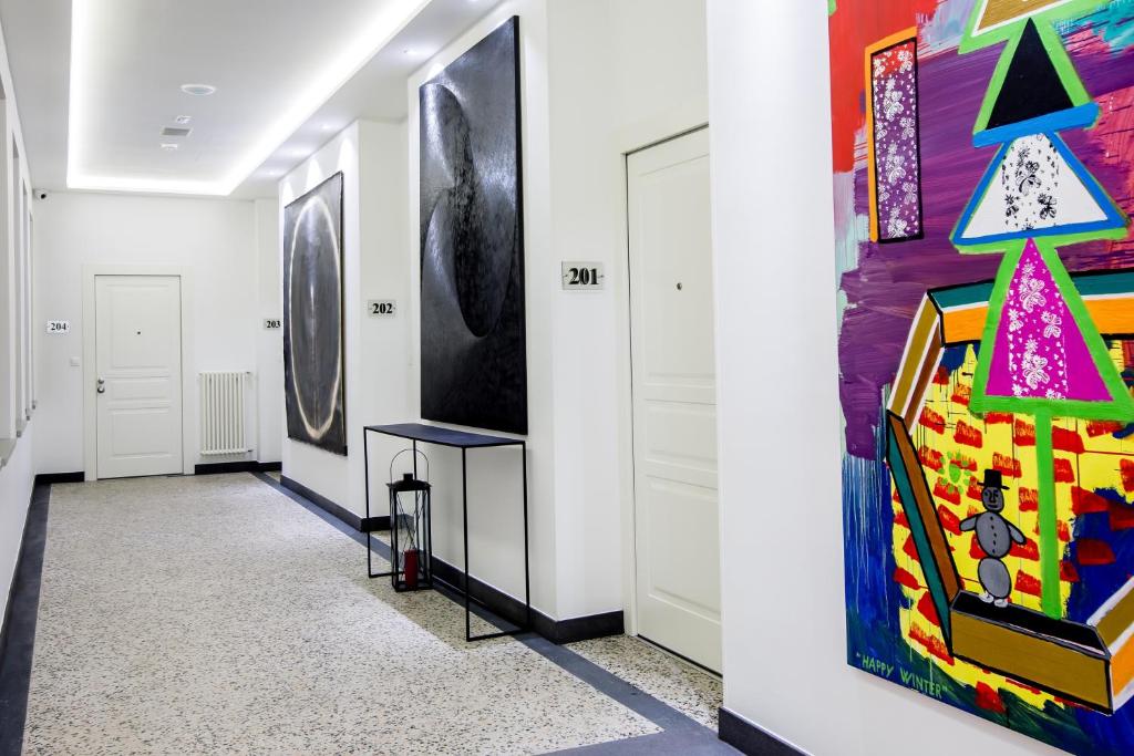 TV a/nebo společenská místnost v ubytování WH Apartments