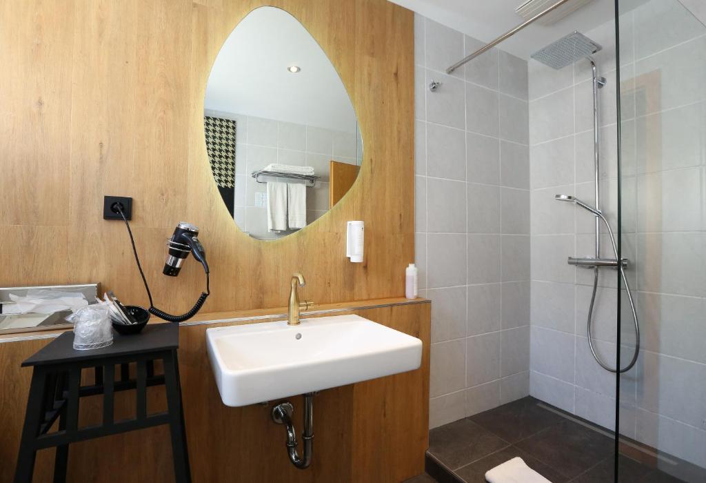 Koupelna v ubytování Arthotel ANA Goggl