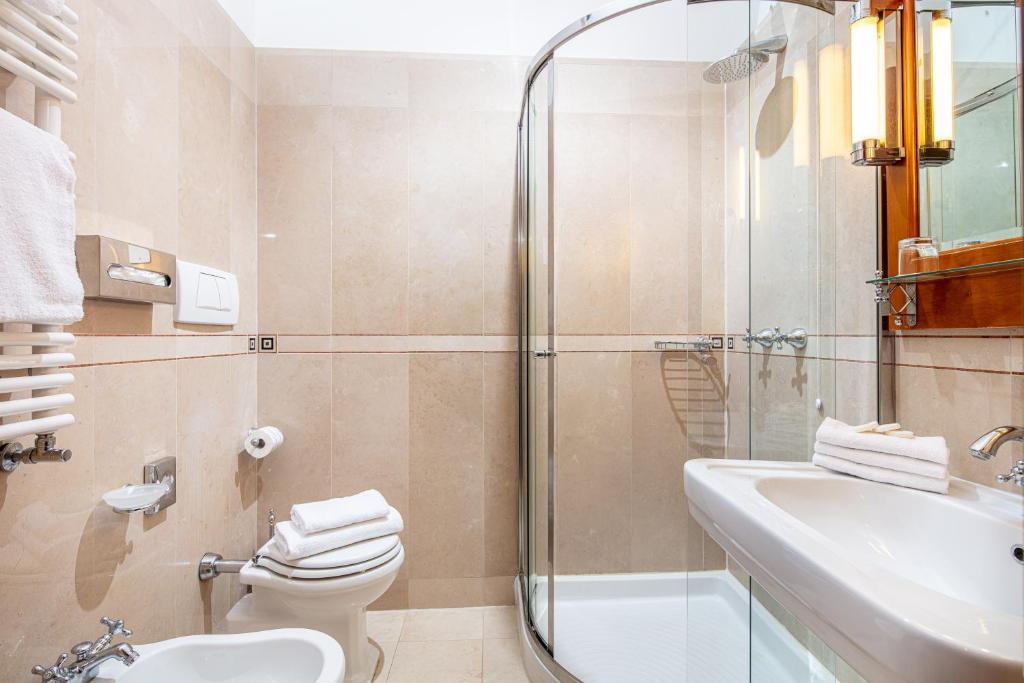 Koupelna v ubytování All’Angelo Art Hotel