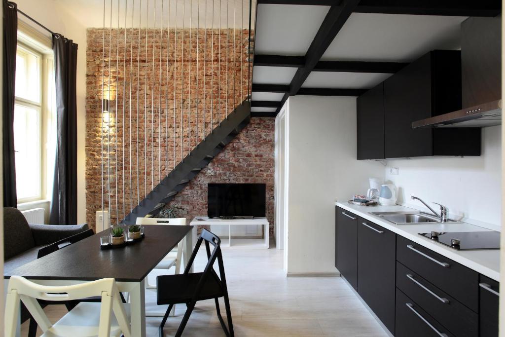 Kuchyň nebo kuchyňský kout v ubytování Apartment House - The Modern Flat