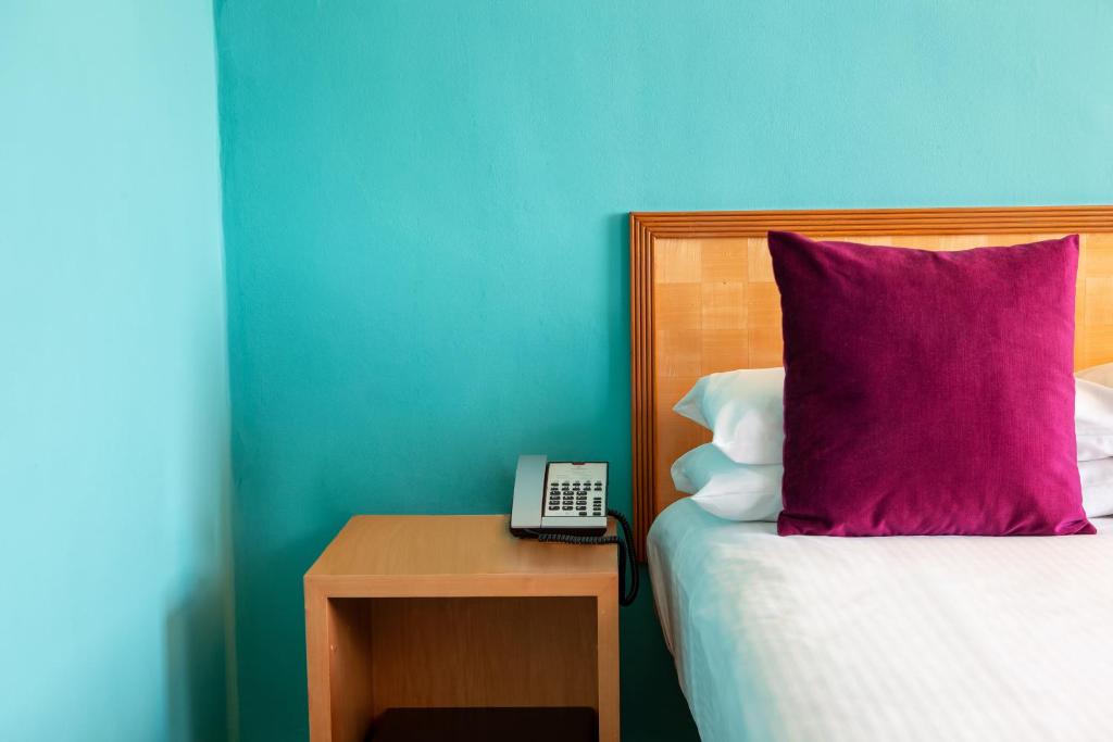 Postel nebo postele na pokoji v ubytování Copthorne Tara Hotel London Kensington