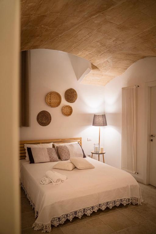 Postel nebo postele na pokoji v ubytování DIMORI Guest House