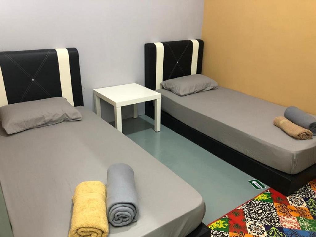 Postel nebo postele na pokoji v ubytování NY TROPICAL BACKPACKERS