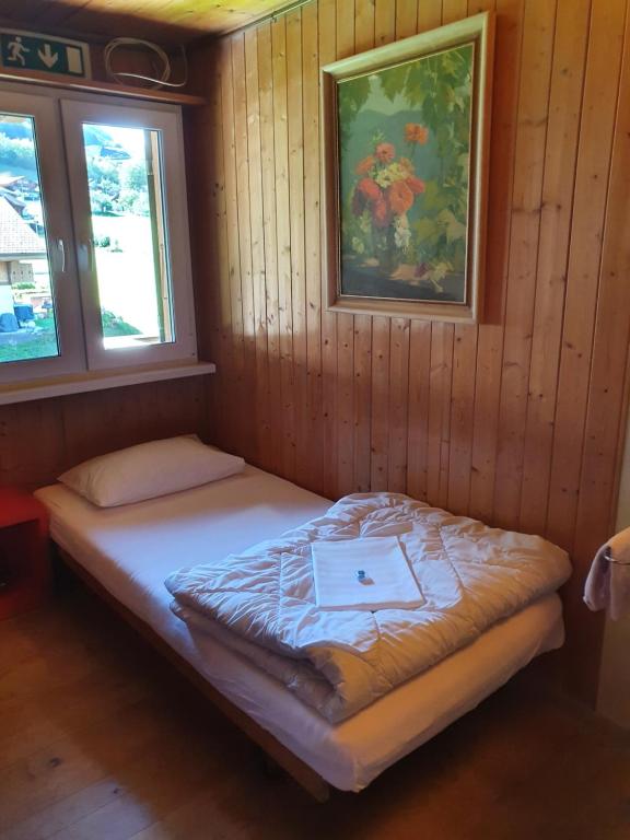 Postel nebo postele na pokoji v ubytování Lake Lodge Hostel