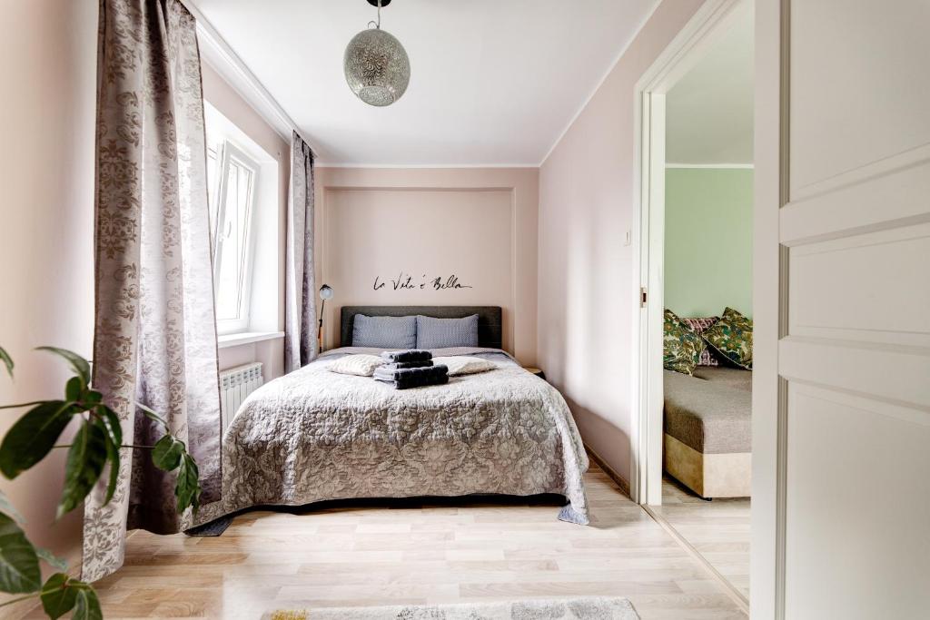Postel nebo postele na pokoji v ubytování Aura, City Center, Tartu Home