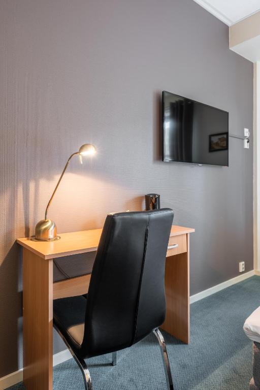 TV a/nebo společenská místnost v ubytování Sure Hotel by Best Western Ole Tobias