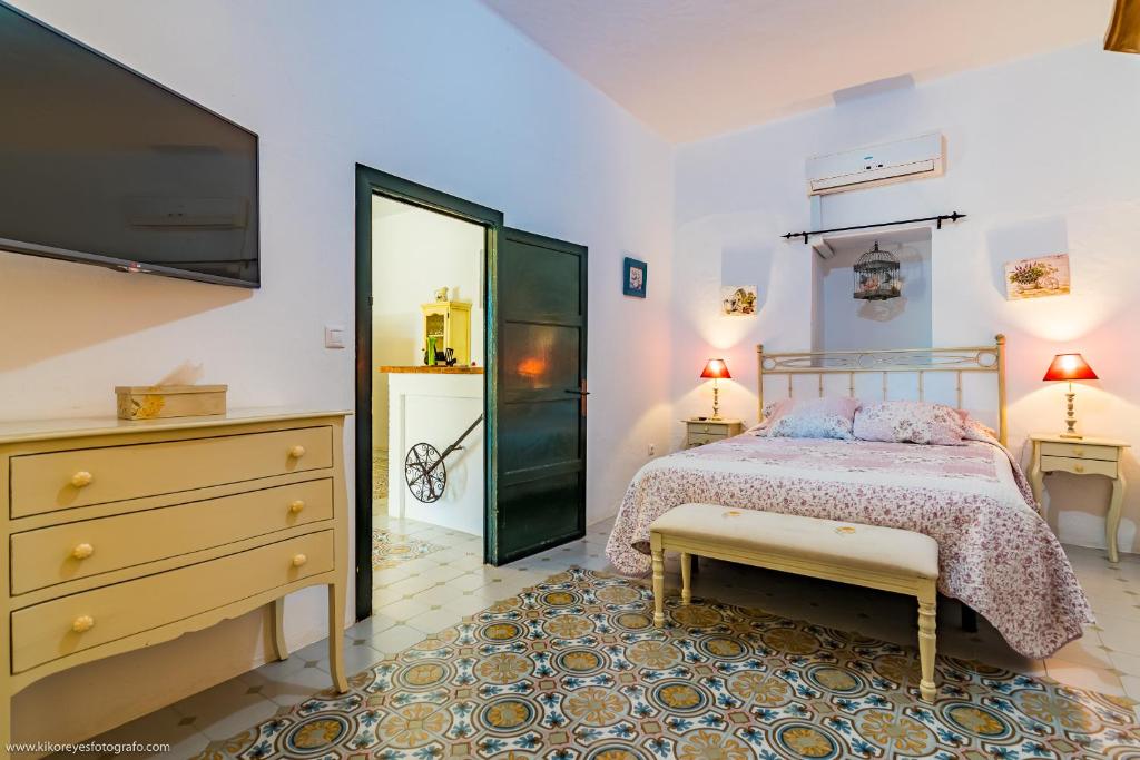 Cama o camas de una habitación en Cortijo El Indiviso