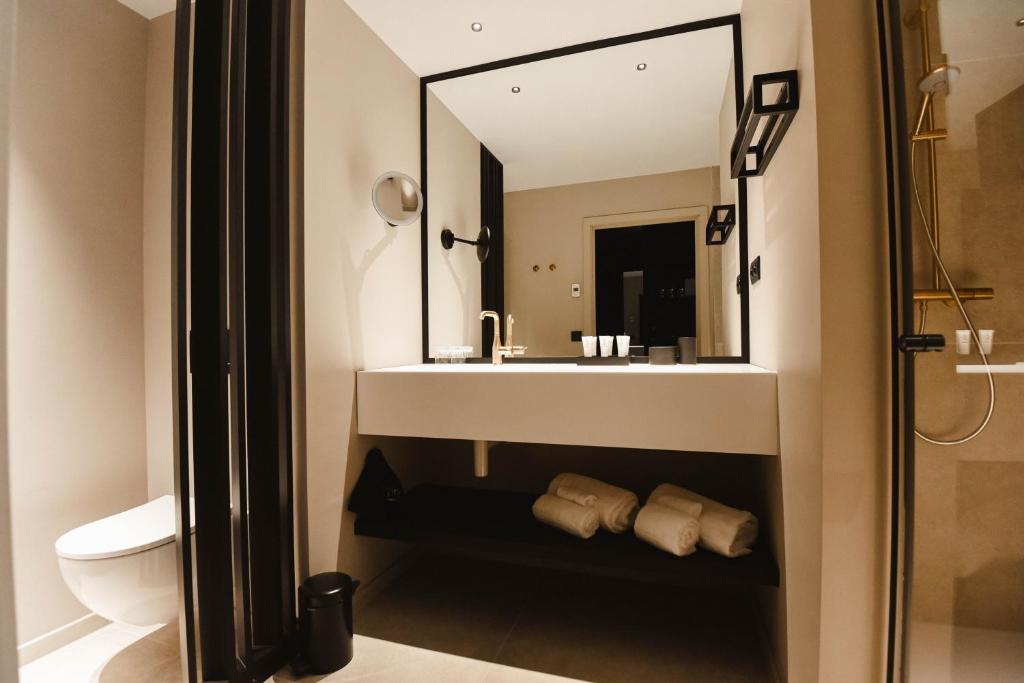 Koupelna v ubytování Hotel Sanglier