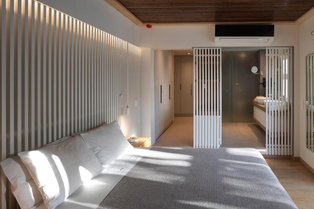 Postel nebo postele na pokoji v ubytování Atrium Hotel