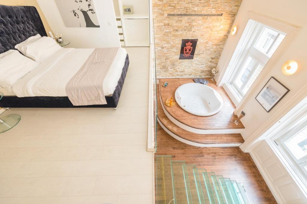 Kúpeľňa v ubytovaní Enzo Capo Jacuzzi Andrassy