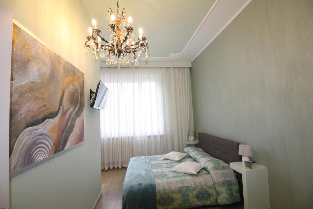 Postel nebo postele na pokoji v ubytování Ad Astra Rooms