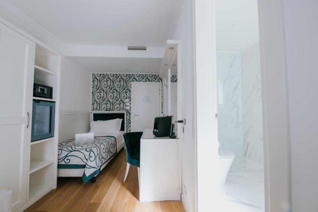 Kuchyň nebo kuchyňský kout v ubytování Hotel Città di Parenzo