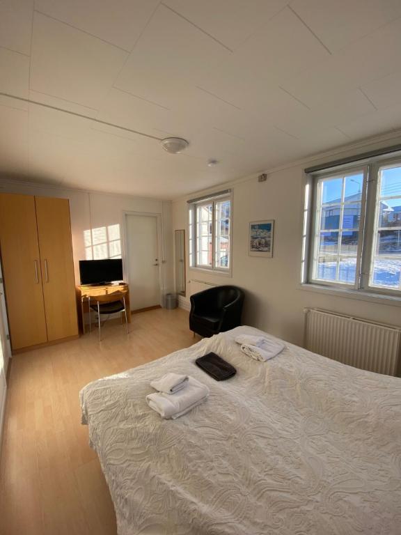 Postel nebo postele na pokoji v ubytování Hotel Disko Island