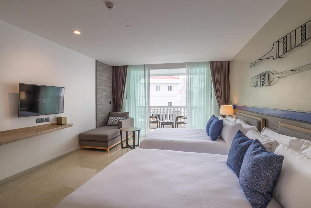 Postel nebo postele na pokoji v ubytování Centara Ao Nang Beach Resort & Spa Krabi