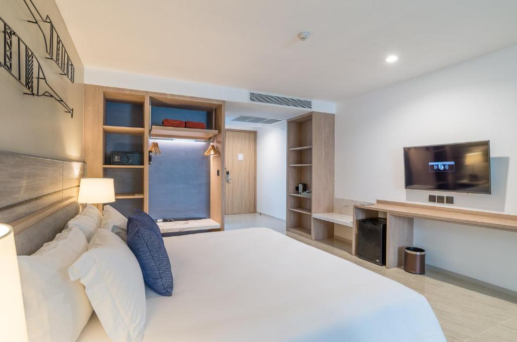 Postel nebo postele na pokoji v ubytování Centara Ao Nang Beach Resort & Spa Krabi