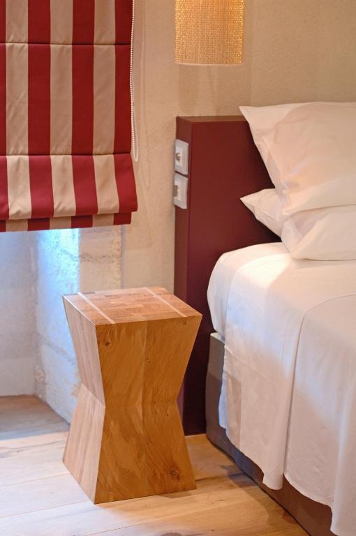 Postel nebo postele na pokoji v ubytování Au Vieux Moulin
