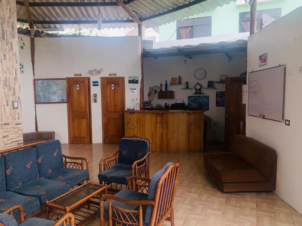 Kuchyň nebo kuchyňský kout v ubytování Hostal White House Galapagos