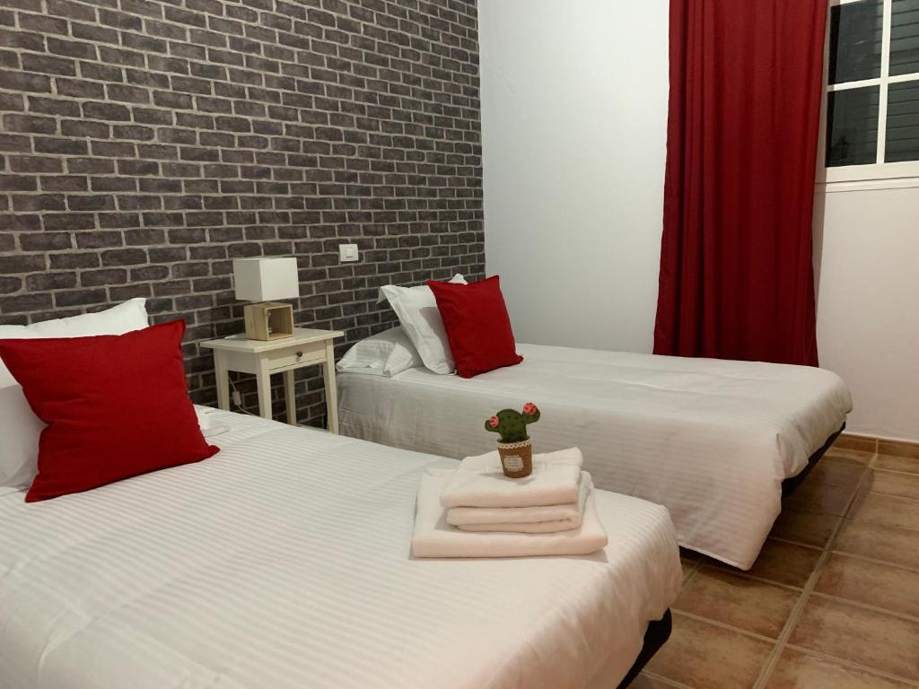 A bed or beds in a room at Pico Partido villa heated pool
