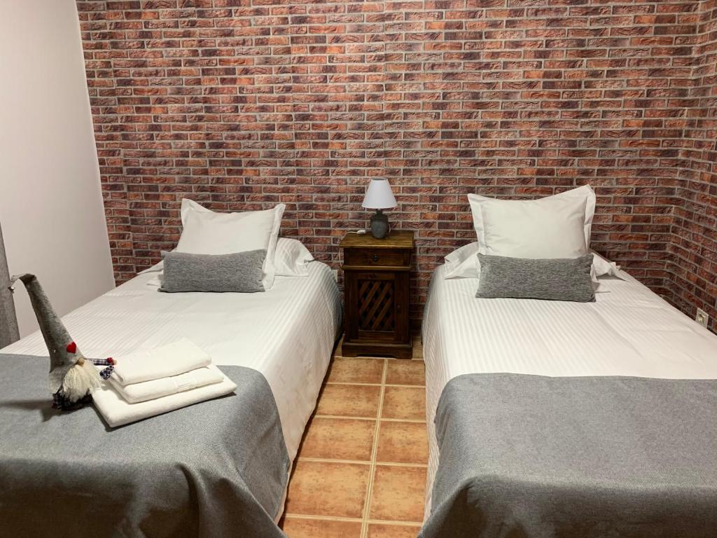 A bed or beds in a room at Pico Partido villa heated pool