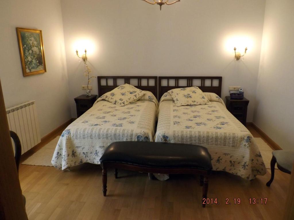 Postel nebo postele na pokoji v ubytování Hotel Azkue