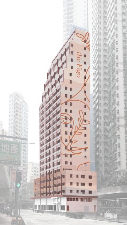香港にあるthe Figoの看板が横に建つ高層ビル