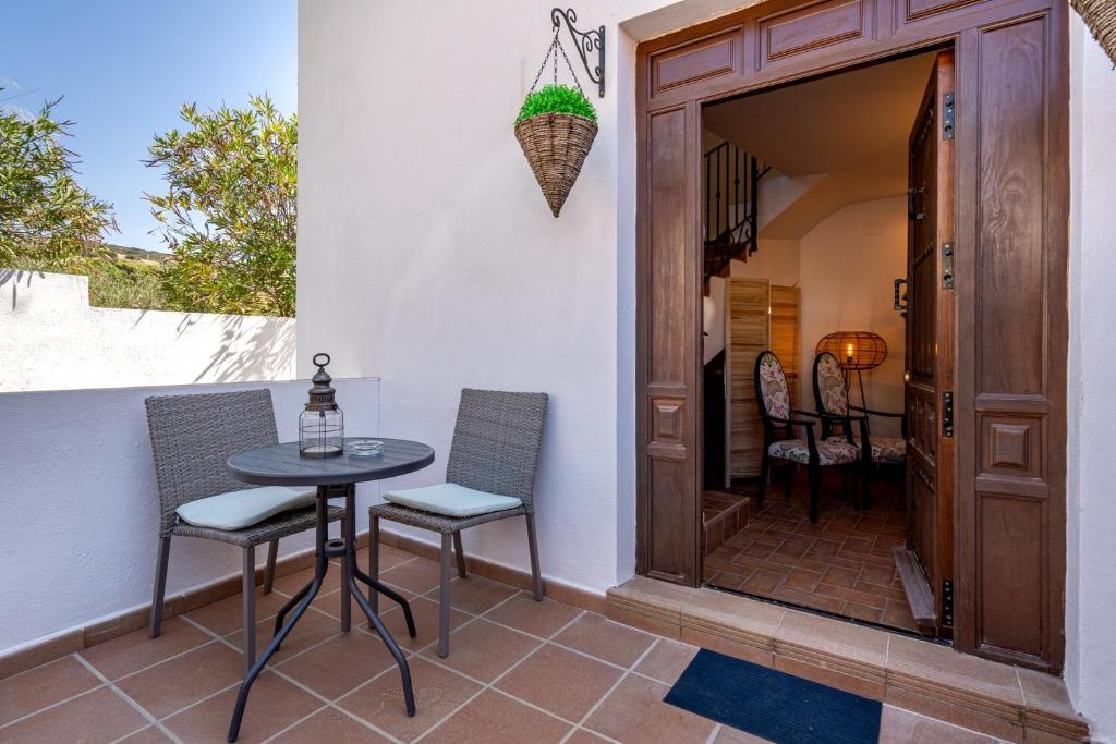Hacienda la buena vida B&B en appartementen - Sala Matrimoniali Con Vista Piscina