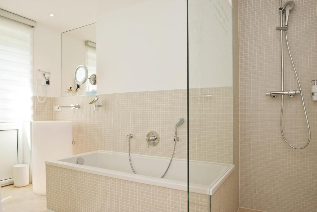 Koupelna v ubytování Hotel Gude