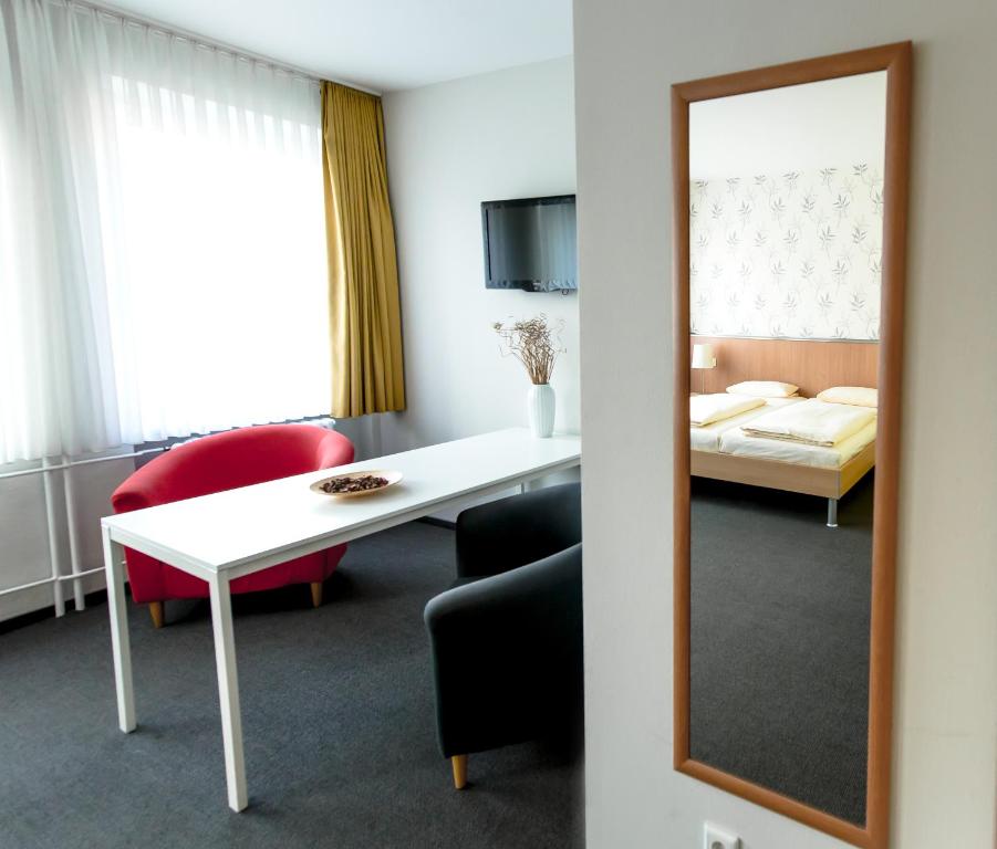 Postel nebo postele na pokoji v ubytování Hotel Flämischer Hof