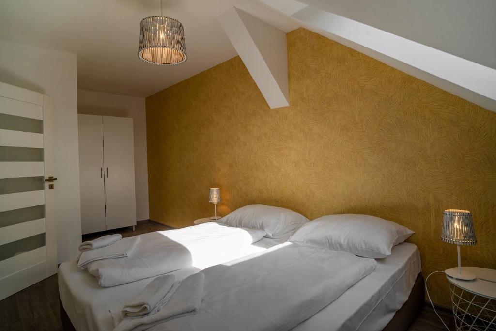 Lova arba lovos apgyvendinimo įstaigoje Apartmany Pisek
