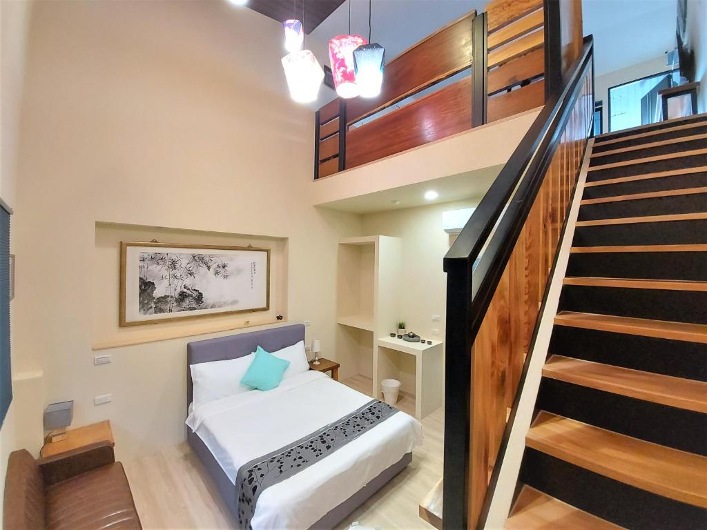 Postel nebo postele na pokoji v ubytování Dosun B&B
