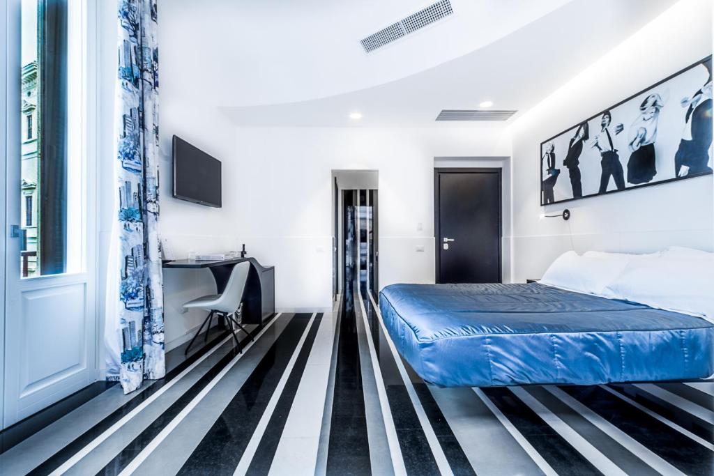 En eller flere senger på et rom på V-Accommodation IV Fontane