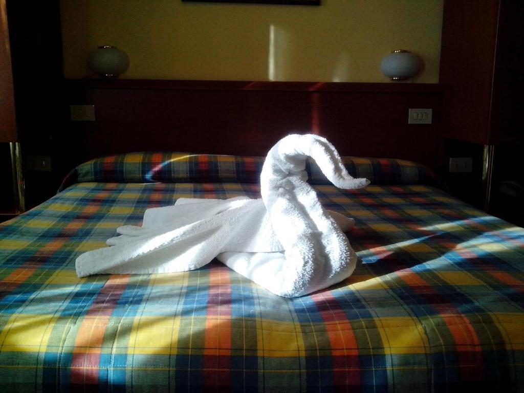 Postel nebo postele na pokoji v ubytování Hotel Monte Fior