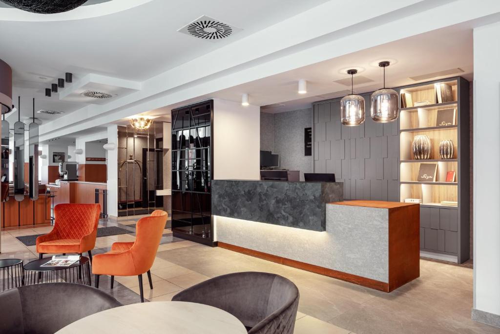 Posezení v ubytování Astoria Hotel