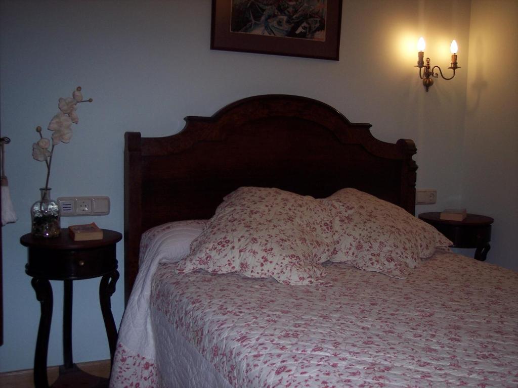 Postel nebo postele na pokoji v ubytování Hotel Azkue