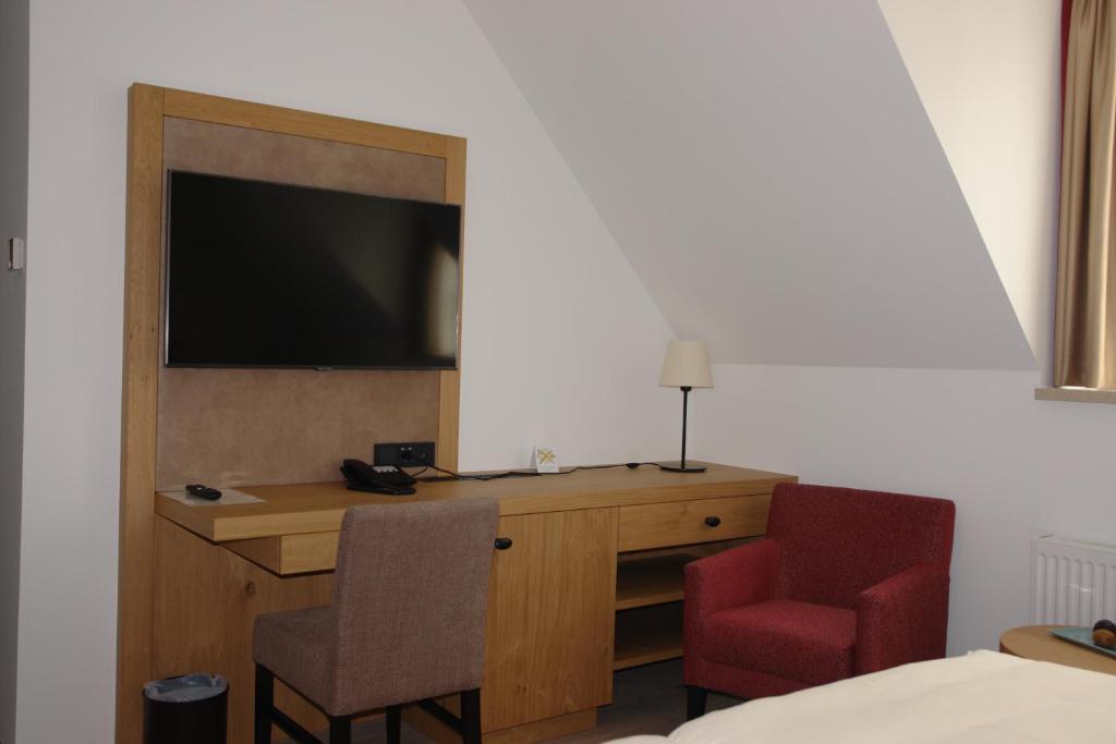 TV a/nebo společenská místnost v ubytování Hotel Kallstadter Hof