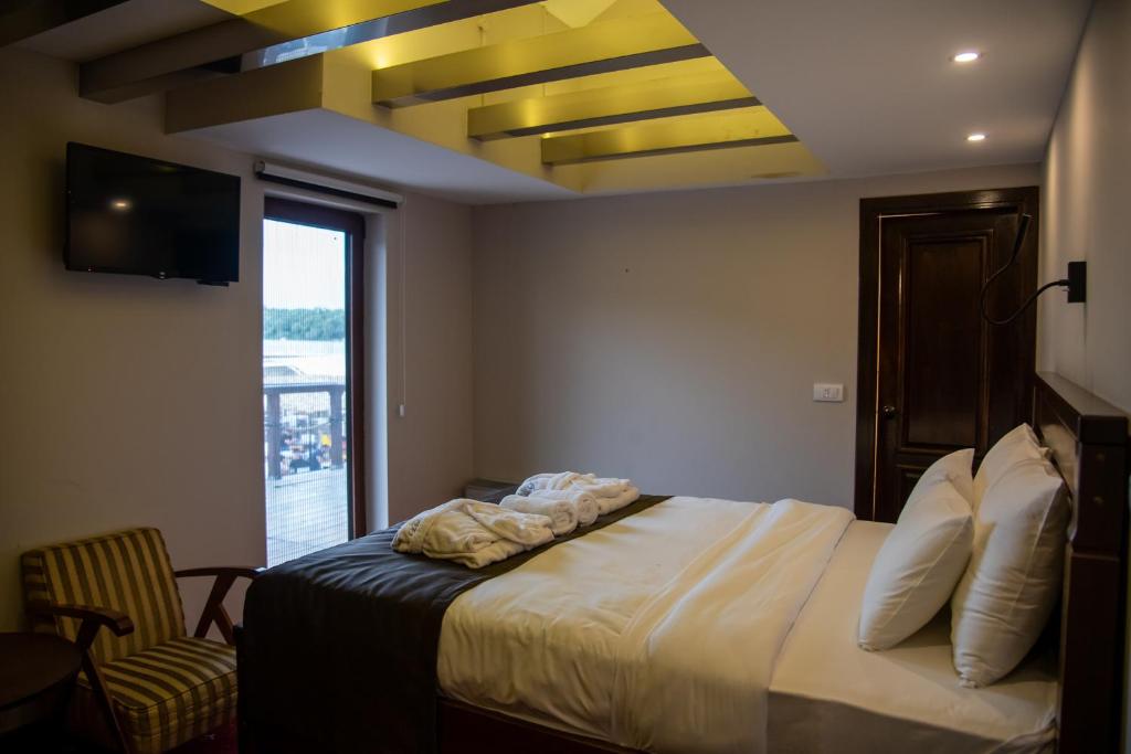 Postel nebo postele na pokoji v ubytování Bahus Inn