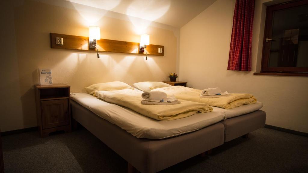 Postel nebo postele na pokoji v ubytování Haus Innerwald by Châtel Reizen