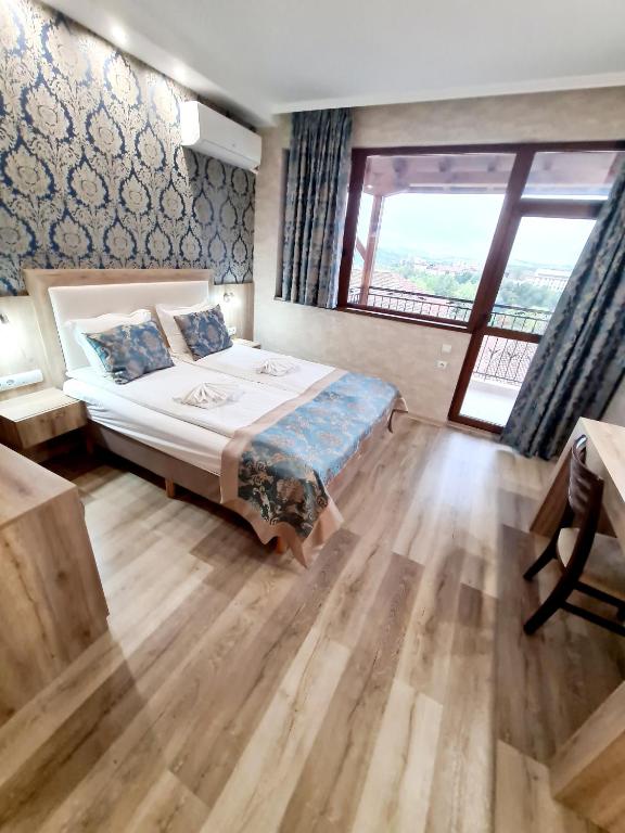 Postel nebo postele na pokoji v ubytování Lucky Hotel